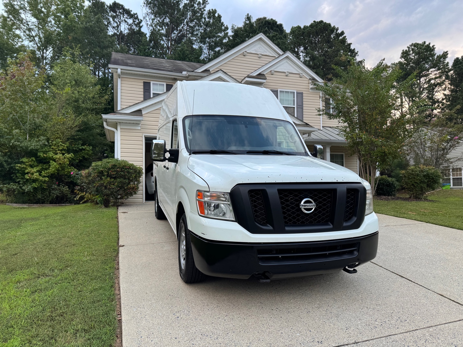 NatKar Loads junk removal van and completed jobs